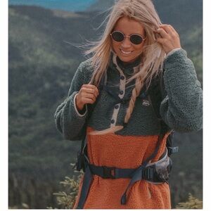 Notice the Reckless Sherpa Cozy Green and Orange Fleece Jacket